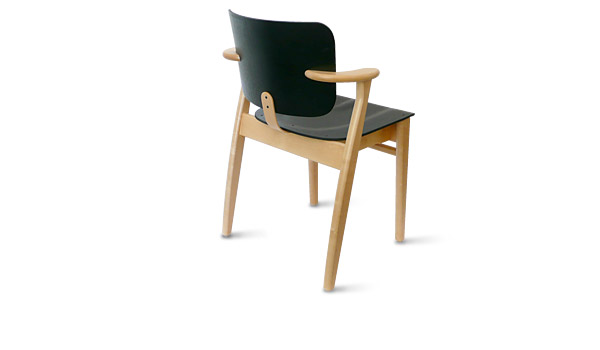Rear view of Domus chair with black seat and birch frame, designed by Ilmari Tapiovaara / Artek.