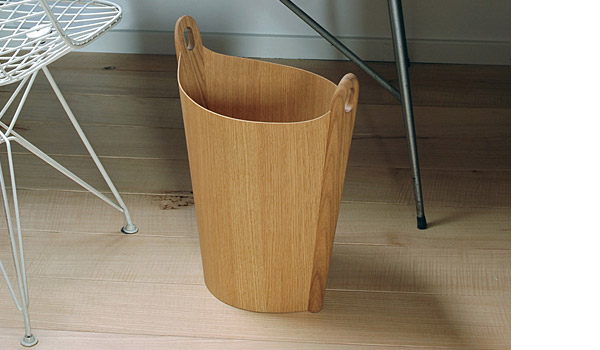 Oval, magazine holder / wastepaper basket by Einar Barnes.