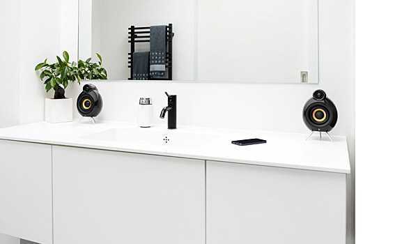 Micropod Bluetooth loudspeakers in black, in bathroom