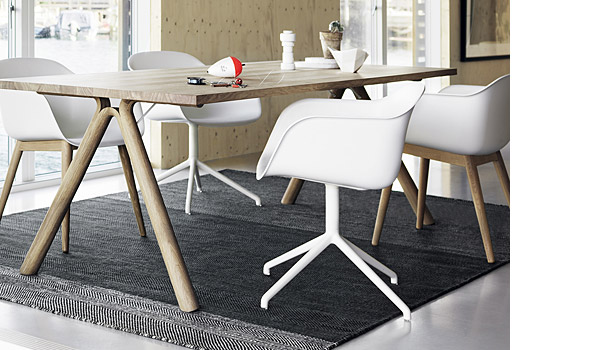 Crushed bowls, seen here on split table with fiber chairs, varjo rug and plus pepper grinder, by Julien de Smedt / Muuto.