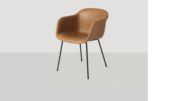 Fiber chair, here upholstered with cognac silk leather and black sled base, by Iskos-Berlin / Muuto.