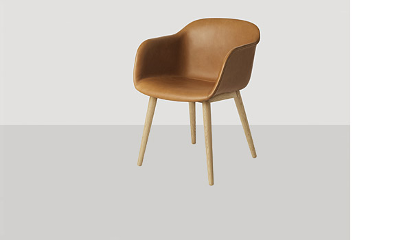 Fiber chair, here with upholstered with leather (cognac) shell and wood base, by Iskos-Berlin / Muuto.
