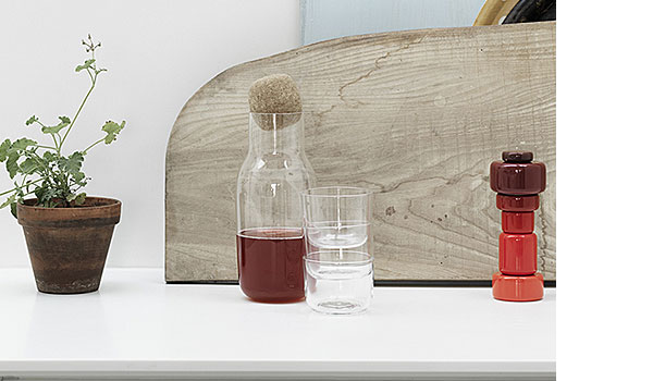 Plus salt and pepper grinder, seen here with corky carafe and glasses, by Norway Says / Muuto.