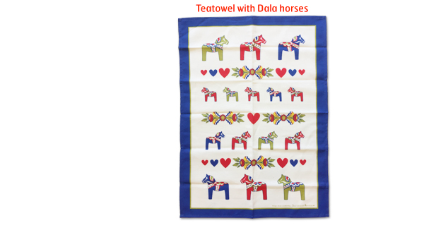 Tea towel with Dala horse pattern.