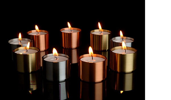 Trepas, tealight holders made from stainless steel, brass and copper - available in sets of six or nine, by Peter Karpf / ArchitectMade.