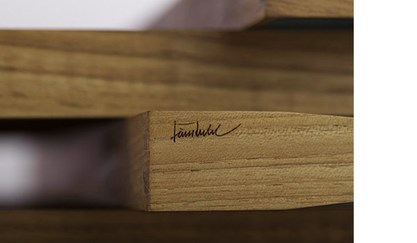Finn Juhls signature embossed in the turning tray.