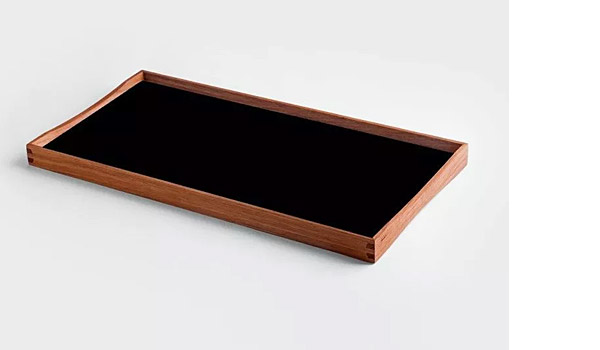 Turning Tray serving tray, here the black backside of the small version, by Finn Juhl / Architect Made.